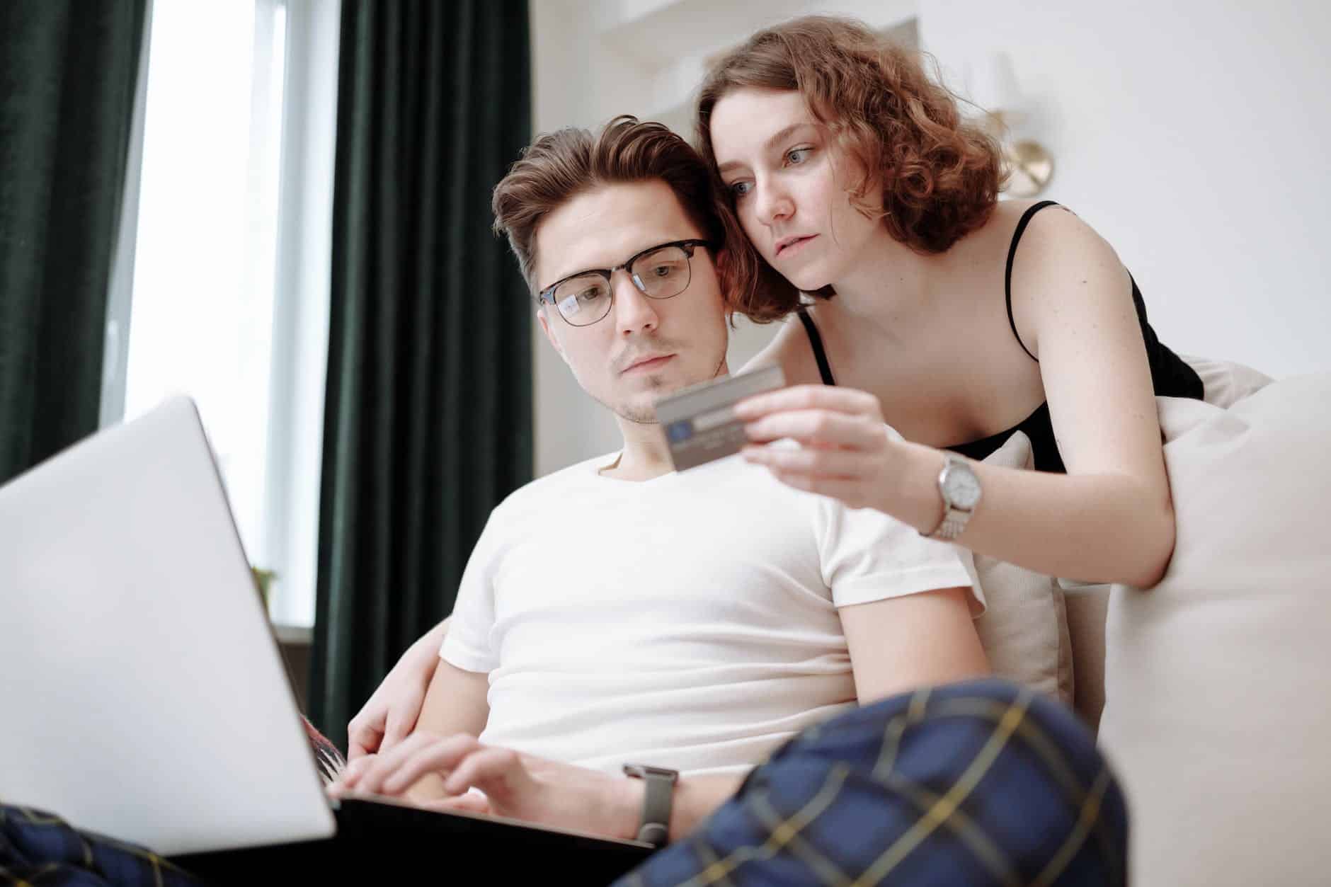 Couple looking at credit card